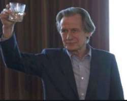 Bill Nighy consuming alcohol